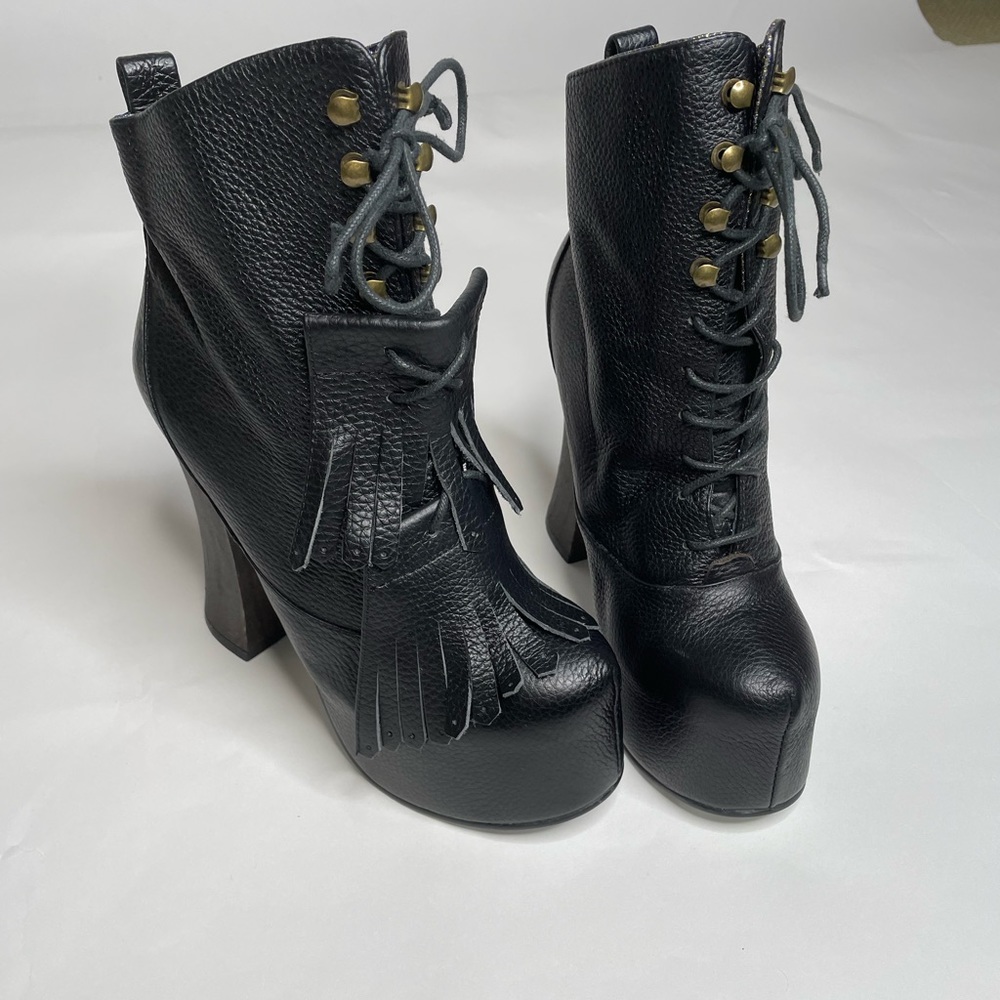 Irregular Choice 8.5 Carnaby Bond Platform boot.